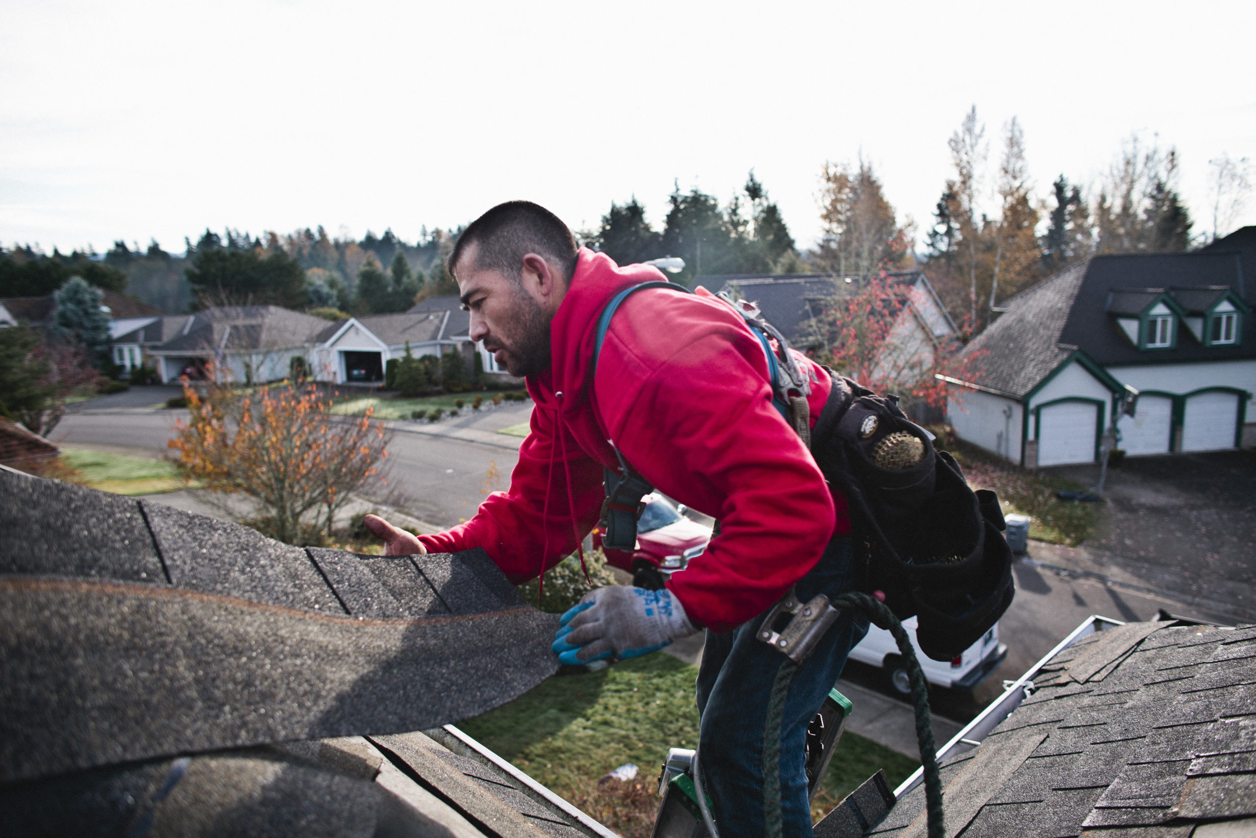 Acme Roofing professional on roof in the Puget Sound