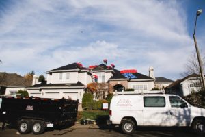 Tacoma's Acme Roofing crew at residential house